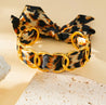 Bracelet Jonc Léopard – Tissu Entrelacé & Acier Inoxydable Doré "léopard" Mara Bijoux