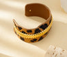 Bracelet Jonc Léopard Ouvert – Tissu Imprimé & Liseré Doré | Écrin Offert "Carla" Mara Bijoux