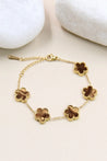 Bracelet Doré Trèfles Nacre Brun Foncé– Acier "Camélia" Mara Bijoux