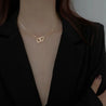 Collier Double Cœur Entrelacé en Acier Inoxydable Doré – Écrin Offert "Coraçao" - Mara Bijoux